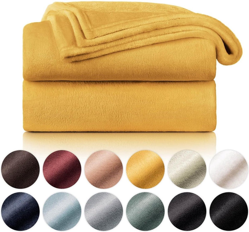 Knuffeldeken van fleece, hoogwaardige deken, Oeko-Tex®-gecertificeerd, 150 x 200 cm, knuffeldeken pluizig als bankdeken, sprei of winterdeken, Spicy Mustard - geel
