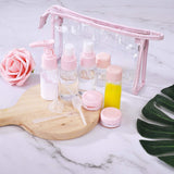 Lege reisflessen set kleine cosmetische container, navulbaar voor vliegtuigshampoo vloeistof draagbare vlucht handbagage accessoires met transparante toilettas, 12 stuks, roze