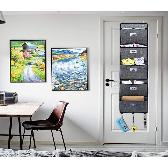 Organizer met 6 vakken om op te hangen; voor deur of wand; geschikt voor o.a. tijdschriften en kranten; gemaakt van textiel