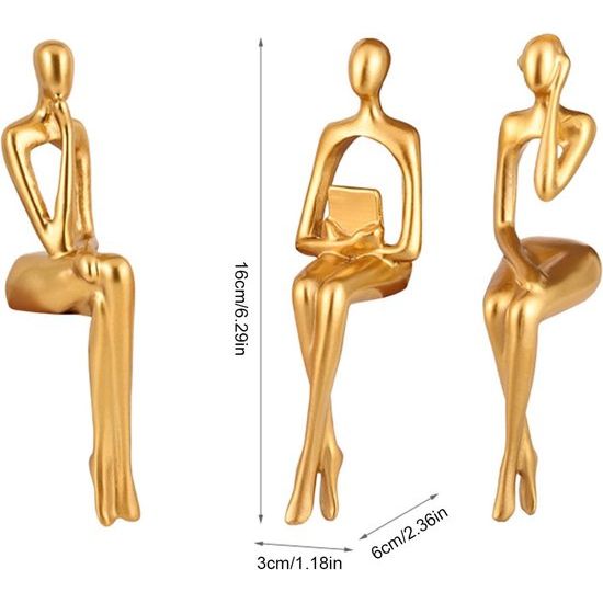Het gouden Thinker-beeldhouwwerk is gemaakt van harsmateriaal,