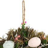 Paaskrans met bloemen en eieren, decoratieve tafelkrans, deurkrans met ophanghaak. Translation: Paaswreath met bloemen en eieren, decoratieve tafelwreath, deurwreath met ophanghaak.