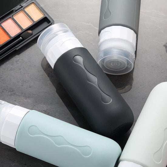 Siliconen reisflessen, 90 ml, set van 4 stuks, lekvrije reiscontainers en toiletartikelen, FDA goedgekeurde navulbare vloeistofcontainer voor shampoo, crème, spoeling en lichaamsverzorging, zwart