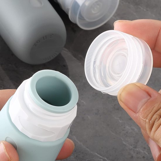 Siliconen reisflessen, 90 ml, set van 4 stuks, lekvrije reiscontainers en toiletartikelen, FDA goedgekeurde navulbare vloeistofcontainer voor shampoo, crème, spoeling en lichaamsverzorging, zwart