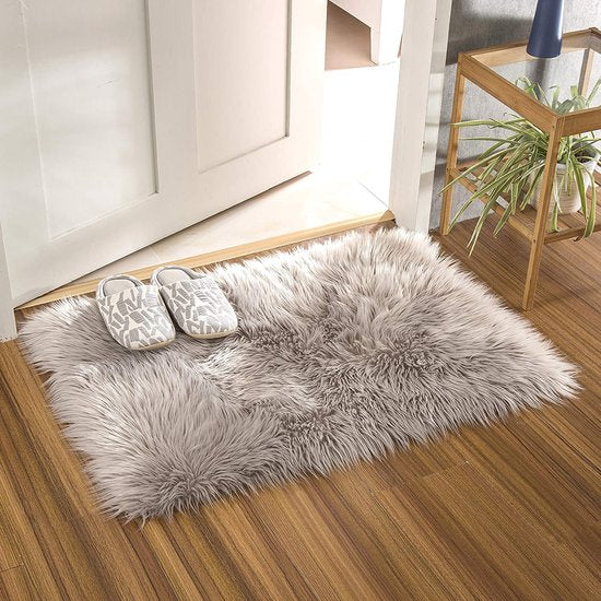 schapenvacht voor woonkamer, slaapkamer, kinderkamer; als kleed voor het bed of in een stoel of bank.