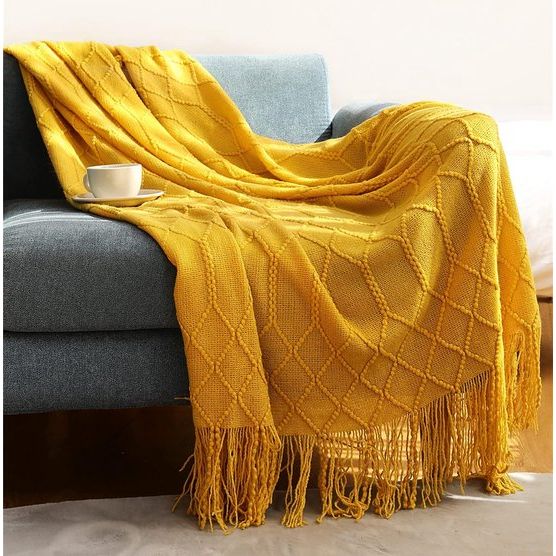 De lichte bankdeken is een echte eyecatcher voor elke slaap- en woonkamer 130x200