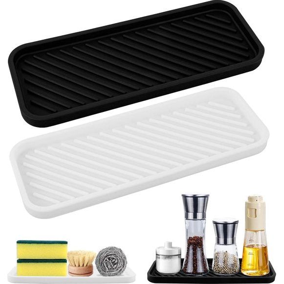 Siliconen sponsenhouder 2 stuks, siliconen spoelbakorganisator, siliconen sponshouder voor de gootsteen, smalle afdruipmat, spons zeepkist, siliconenmat voor de wastafel, siliconen plank voor de keuken en badkamer (zwart-wit).