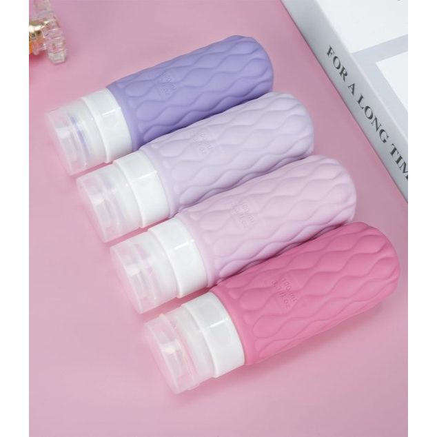 Siliconen reisflessenset 100 ml, set van 4 reisshampoocontainers, BPA-vrije reiscontainer en toiletartikelenset voor shampoocrème, reisflessen met transparante toilettas met ritssluiting