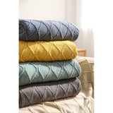 De lichte bankdeken is een echte eyecatcher voor elke slaap- en woonkamer 130x200