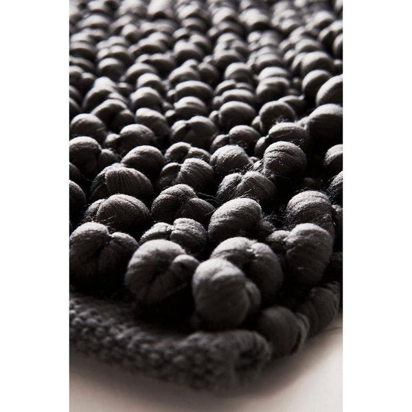 Popcorn-badmat, mix van katoen en polyester - grijs, 80 x 150 cm Popcorn-badmat, een mix van katoen en polyester - grijs, 80 x 150 cm.